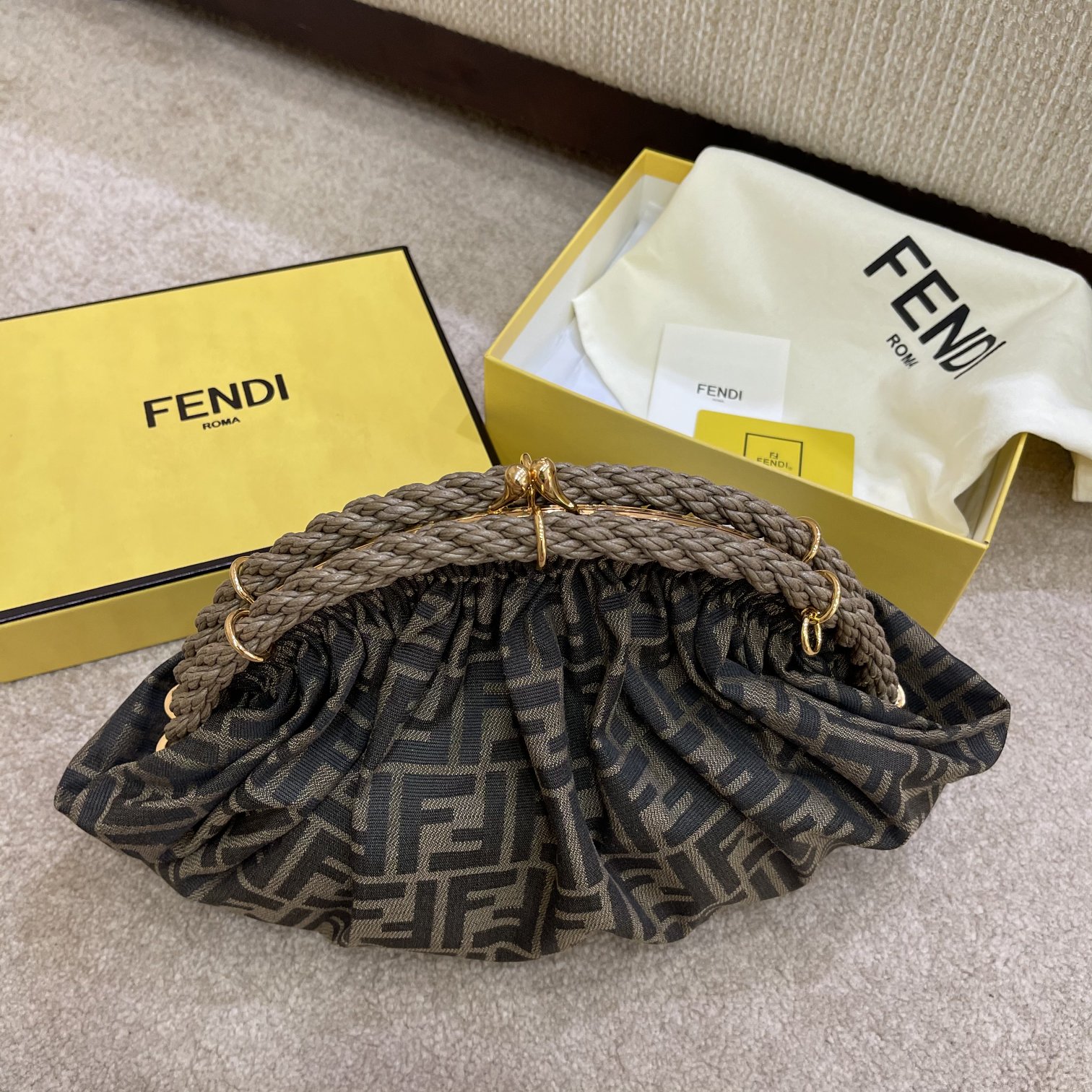 FENDI'S LATEST SHELL DUMPLING CLOUD CLUTCH BAG