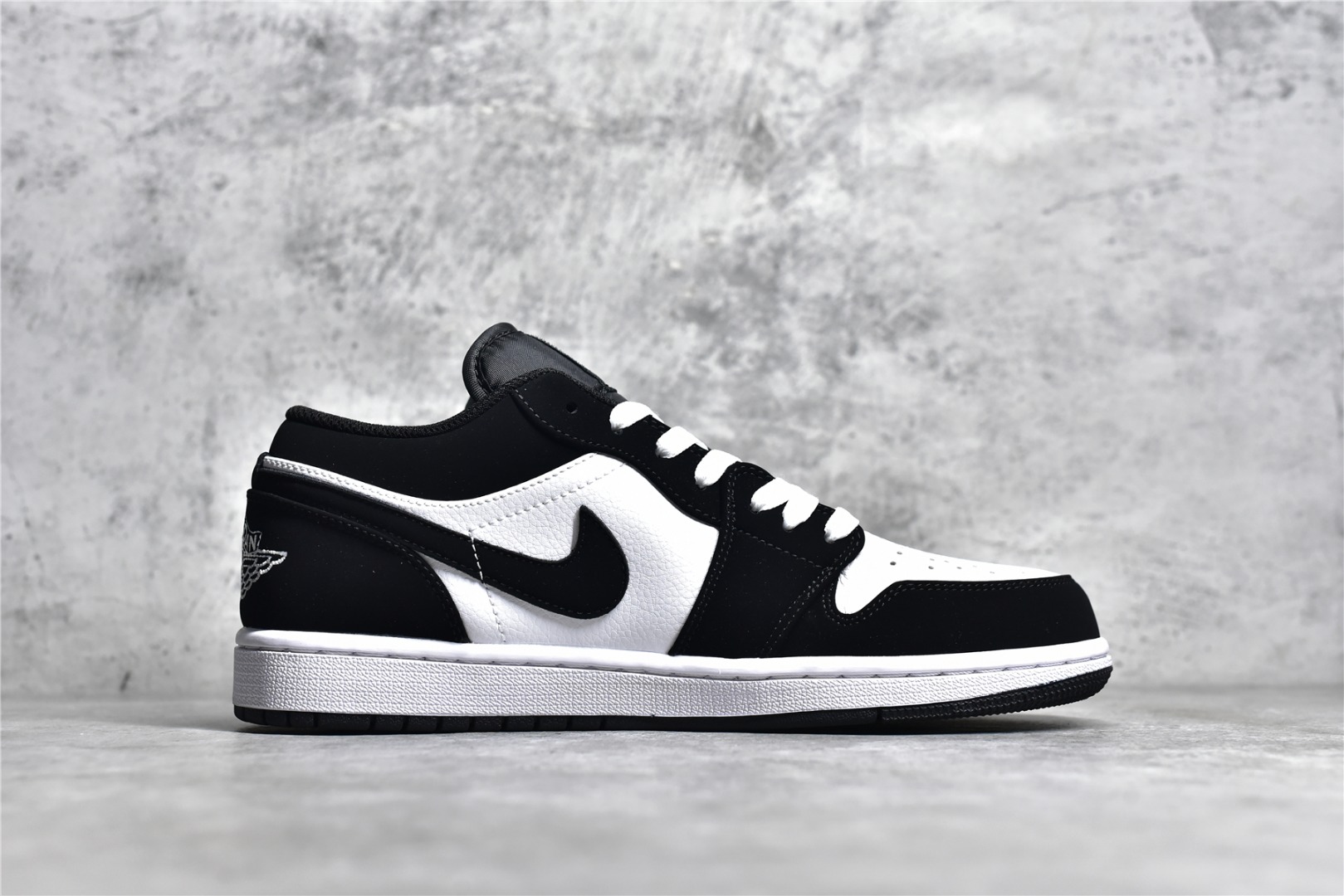 AIR JORDAN AJ1 LOW TOP ZWART EN WIT