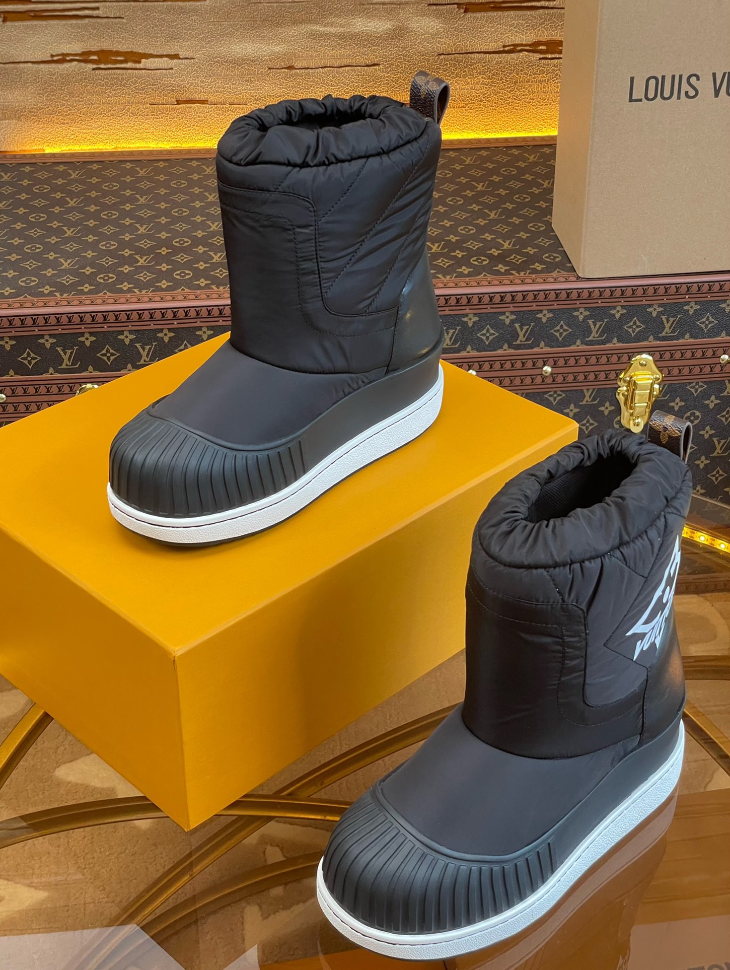 LOUIS VUITTON SNOW BOOTS