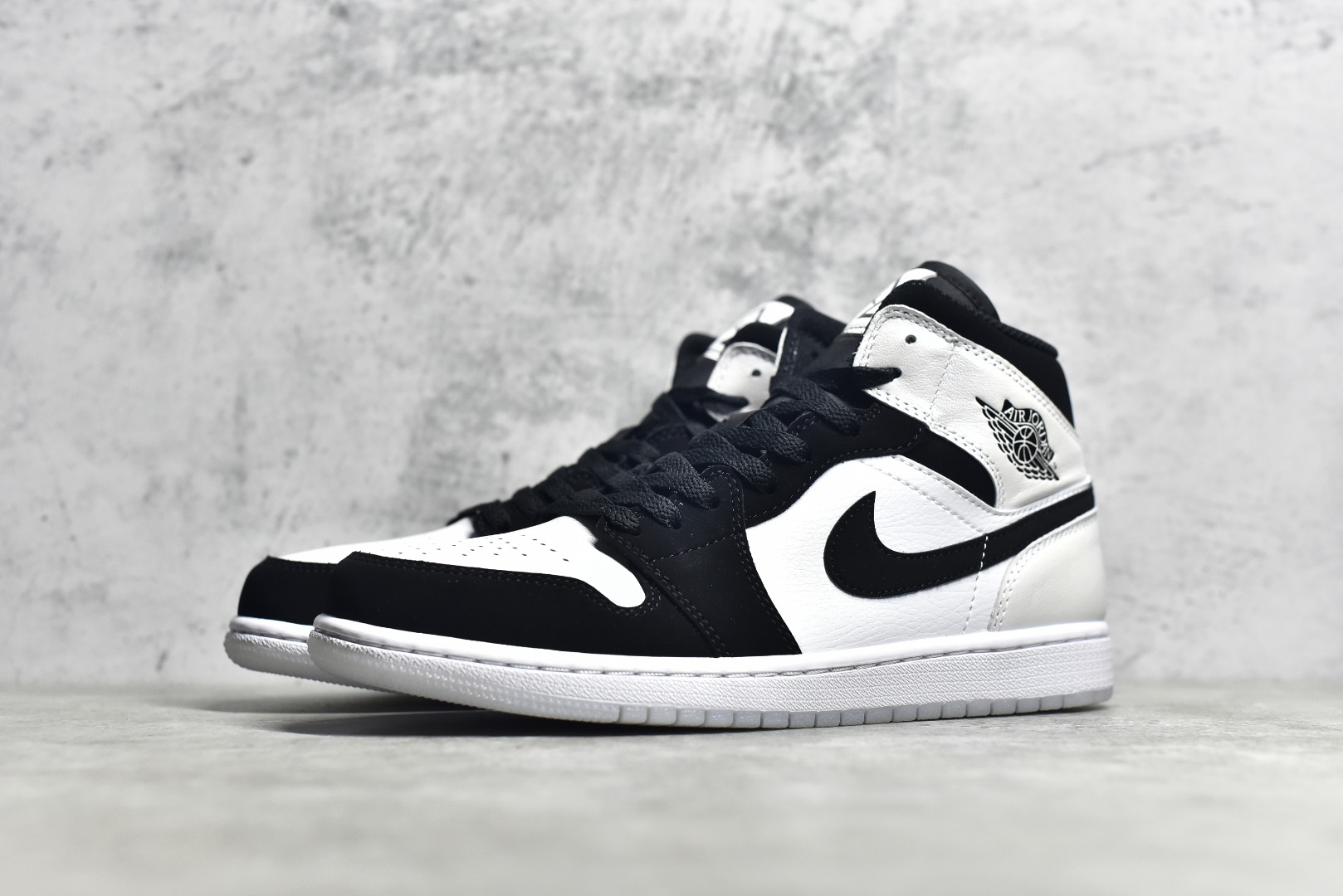 AIR JORDAN 1 MID BLACK AND WHITE PANDA